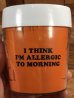 スヌーピーの“I Think I'm Allergic To Morning”のメッセージが書かれたビンテージマグカップ