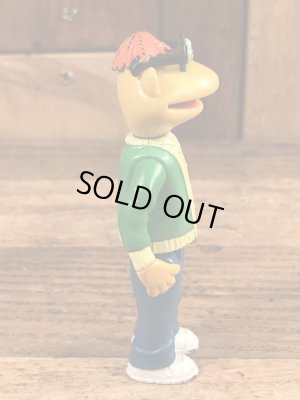 フィッシャープライス社製のスクーターのビンテージフィギュア