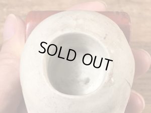 スカルオンブックの顎揺れするビンテージマッチホルダー