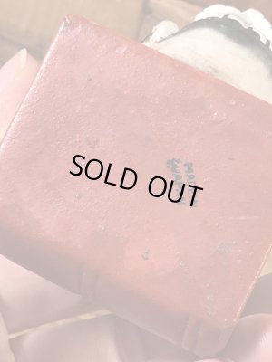 スカルオンブックの顎揺れするビンテージマッチホルダー