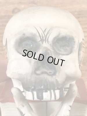 スカルオンブックの顎揺れするビンテージマッチホルダー