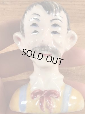 酔っ払いの四つ目のビンテージ塩コショウ入れ