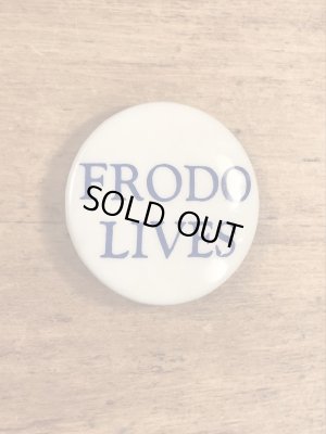 Frodo Livesのメッセージが書かれたビンテージ缶バッジ