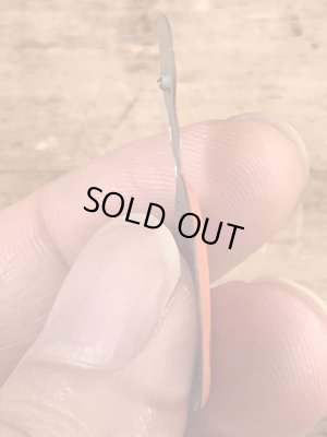 スマイルの顔が描かれたヴィンテージタブバッチ