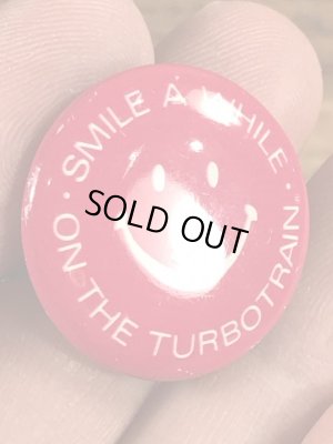 スマイルの顔とメッセージが書かれたビンテージ缶バッジ