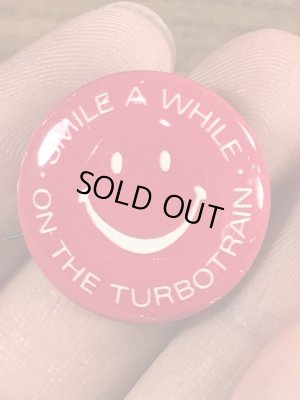 スマイルの顔とメッセージが書かれたビンテージ缶バッジ