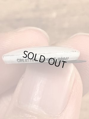 スマイルフェイスのブリキ製のヴィンテージ缶バッチ