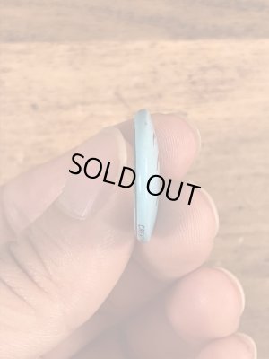 スマイルの顔が描かれたビンテージ缶バッジ