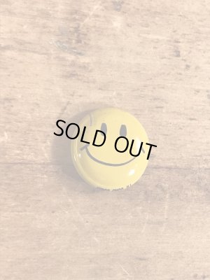 スマイルの顔が描かれたビンテージ缶バッジ