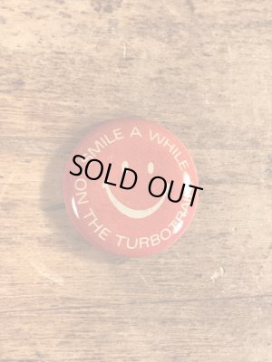 スマイルの顔とメッセージが書かれたビンテージ缶バッジ