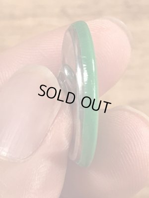 目がクローバーになったスマイルフェイスのヴィンテージ缶バッチ