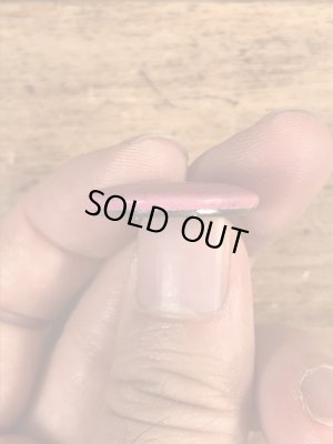 目が$マークになったスマイルフェイスのヴィンテージ缶バッチ