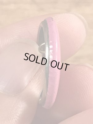 目が$マークになったスマイルフェイスのヴィンテージ缶バッチ