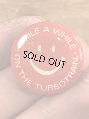 スマイルの顔とメッセージが書かれたビンテージ缶バッジ