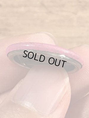 目が$マークになったスマイルフェイスのヴィンテージ缶バッチ