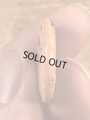 Creative House社製のスマイルのビンテージ缶バッジ