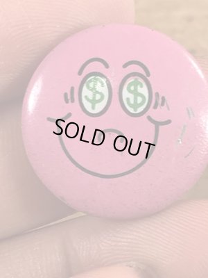 目が$マークになったスマイルのビンテージ缶バッジ