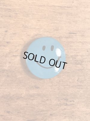 スマイルの顔が描かれたビンテージ缶バッジ