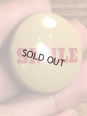 70年代〜頃のスマイルの文字が書かれたビンテージ缶バッジ