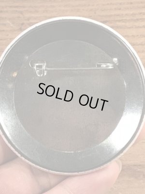 70年代〜頃のハットを被ったスマイルフェイスのヴィンテージ缶バッチ