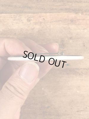 70年代〜頃のハットを被ったスマイルフェイスのヴィンテージ缶バッチ