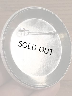 70年代〜頃のハットを被ったスマイルフェイスのヴィンテージ缶バッチ