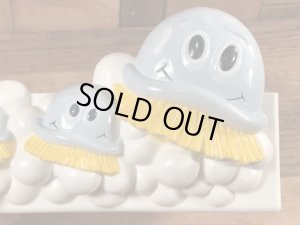 企業キャラクターのスクラビングバブルのヴィンテージバスタブオーガナイザー