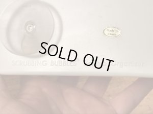 企業キャラクターのスクラビングバブルのヴィンテージバスタブオーガナイザー