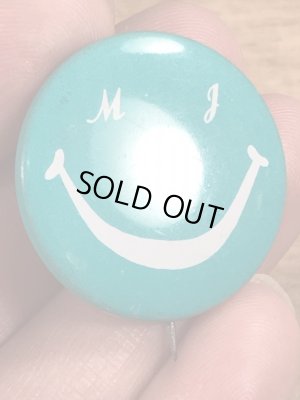 70年代頃のスマイルフェイスのビンテージの缶バッジ