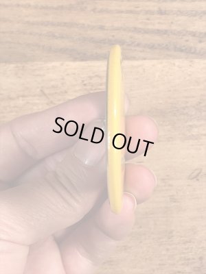 70年代頃の企業物のスマイルフェイスのビンテージの缶バッジ