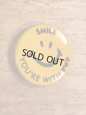 70年代頃の企業物のスマイルのビンテージの缶バッジ