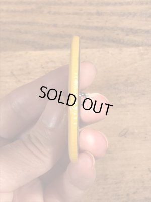 70年代頃の企業物のスマイルフェイスのビンテージの缶バッジ