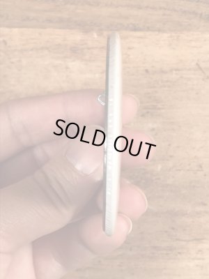 70年代頃の企業物のスマイルのビンテージの缶バッジ