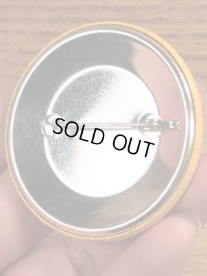 70年代頃の企業物のスマイルフェイスのビンテージの缶バッジ