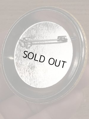 70年代頃の企業物のスマイルのビンテージの缶バッジ