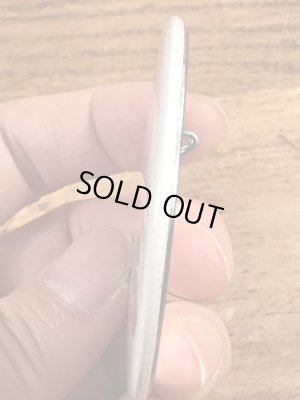 70年代頃の企業物のスマイルのビンテージの缶バッジ