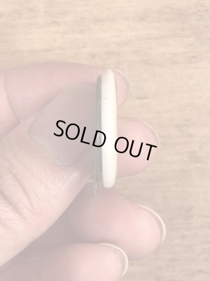 〜70年代頃のイクアリティのビンテージの缶バッジ