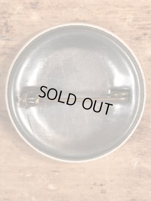 〜40’s頃のMonitorと書かれたヴィンテージの缶バッチ