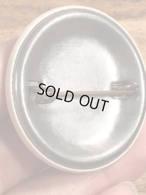 〜40’s頃のMonitorと書かれたヴィンテージの缶バッチ