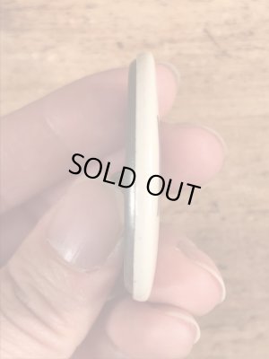 〜40年代頃のMonitorと書かれたビンテージの缶バッジ