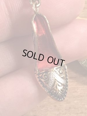 50年代頃のアールデコ調のハイヒールのチャームが付いたビンテージのシューホーン