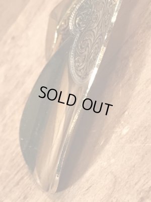 50’s頃のアールデコ調のハイヒールのチャームが付いたヴィンテージの靴ベラ