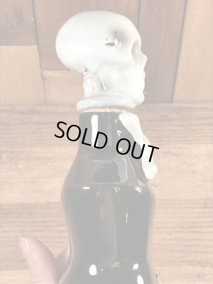 50年代頃の陶器製のスカルのビンテージのデカンタボトル