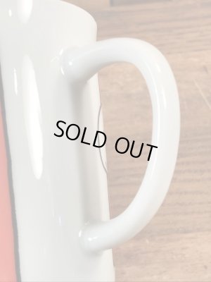 70’sのジョギングをしているスヌーピーのヴィンテージのセラミックマグ