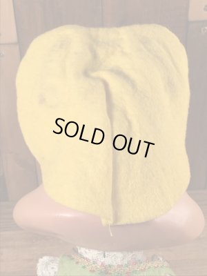 70年代頃のロイデス社製のウサギのビンテージのコインバンクドール