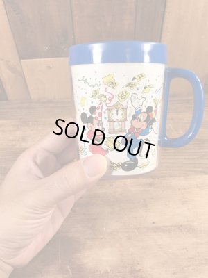 80年代頃のミッキー&ミニーマウスのビンテージのマグカップ