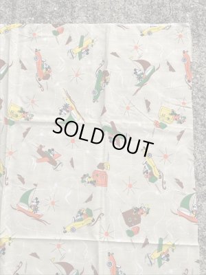 60~70年代頃の乗り物に乗ったミッキーマウスのビンテージの端切れ布