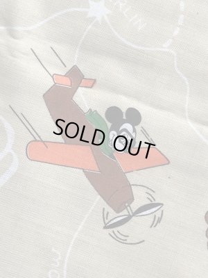 60~70年代頃の乗り物に乗ったミッキーマウスのビンテージの端切れ布