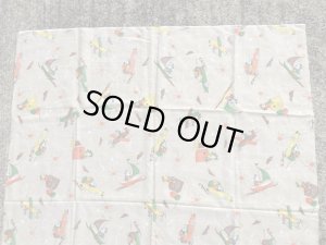 60~70年代頃の乗り物に乗ったミッキーマウスのビンテージの端切れ布