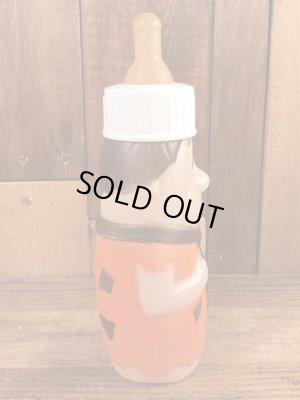 70年代頃のフリントストーンのフレッドのビンテージの哺乳瓶フィギュア